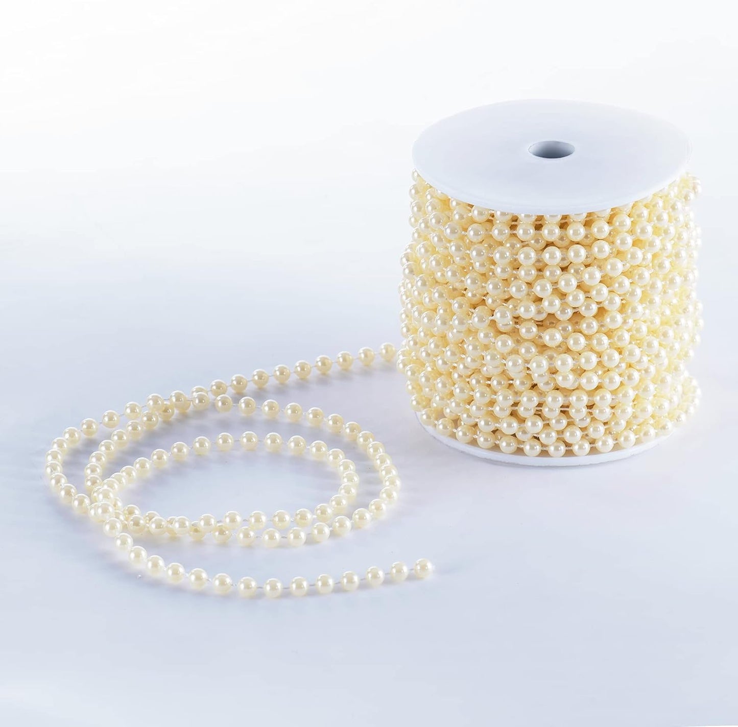 XINHUIDALSQ Craft String of Pearls 6 MM Faux Pearl Beaded,66 Feet Ivory Garland Bead String for Christmas Tree Decorations, Wedding Party Decoration(Ivory, 6mm/20M)