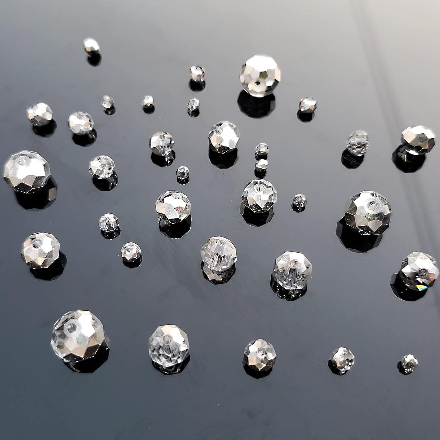 2-10mm Briolette Rondelle 810pcs Half Silver Crystal Glass Beads Faceted Shape Crystal Spacer Beads for Bracelet Necklace Decorative Hand Jewelry Making (2/4/6/8/10mm Half Silver)