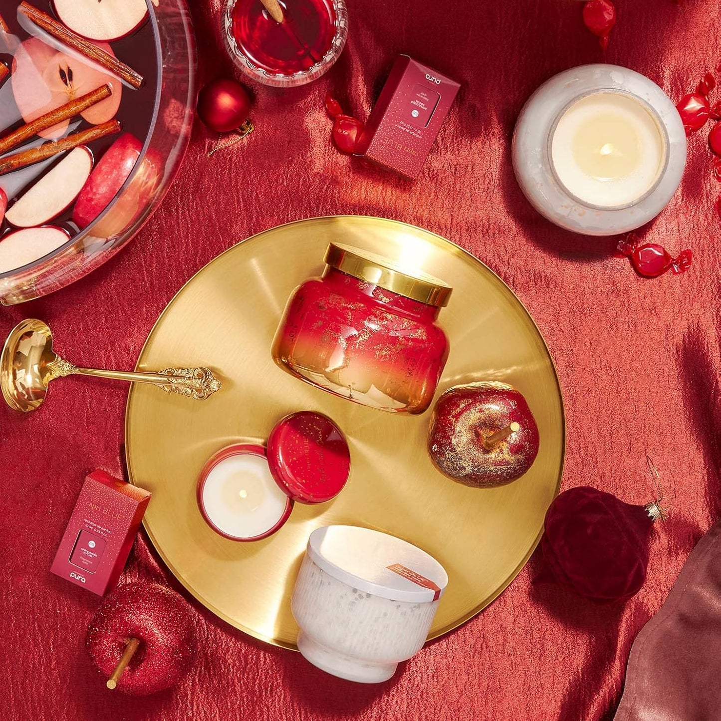 Capri Blue Glimmer Mini Tin - Apple Scented Candle with Mini Candle Holder - Soy Wax Blend - Capri Blue Apple Cider Social Red and Gold (3 oz)